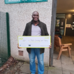 YCSA Chair receiving grant check